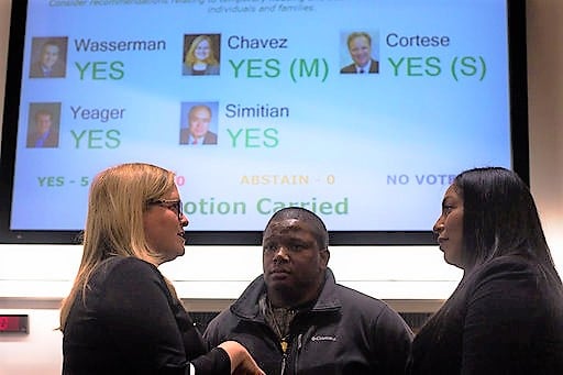 Supervisor Cindy Chavez speaks with Dontae Lartigue and Christina Anaya